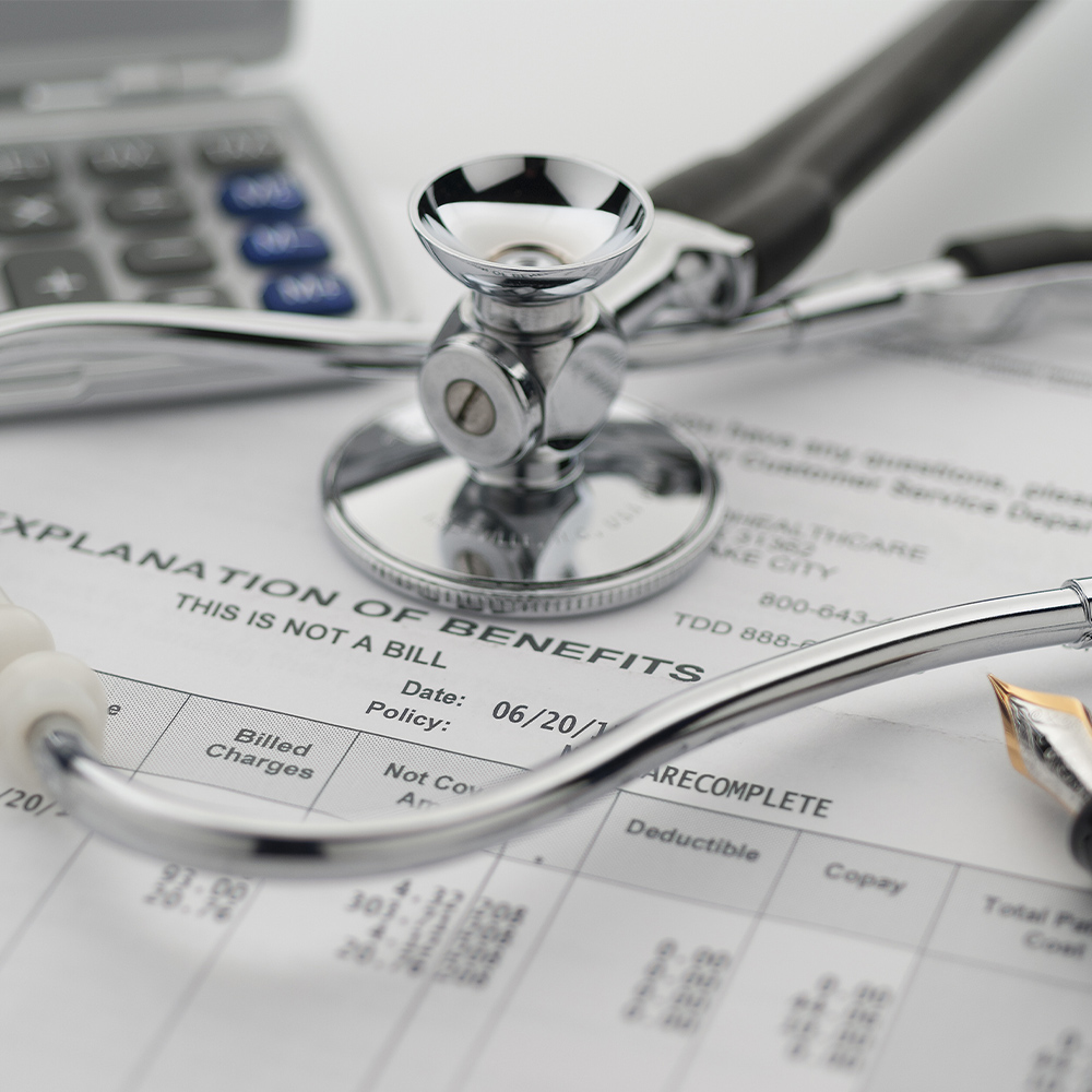 stethoscope on a pile of paperwork
