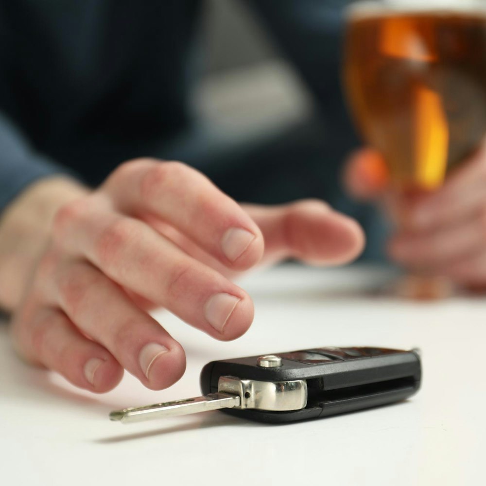 Keys and a glass of liquor