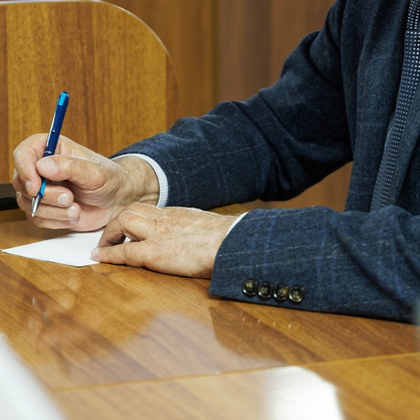 Lawyer completing paperwork