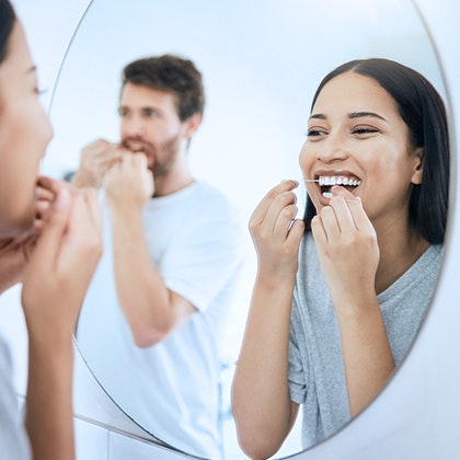 woman flossing