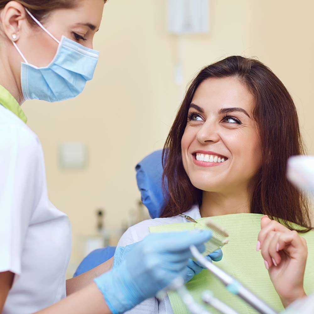 smiling woman at dentist