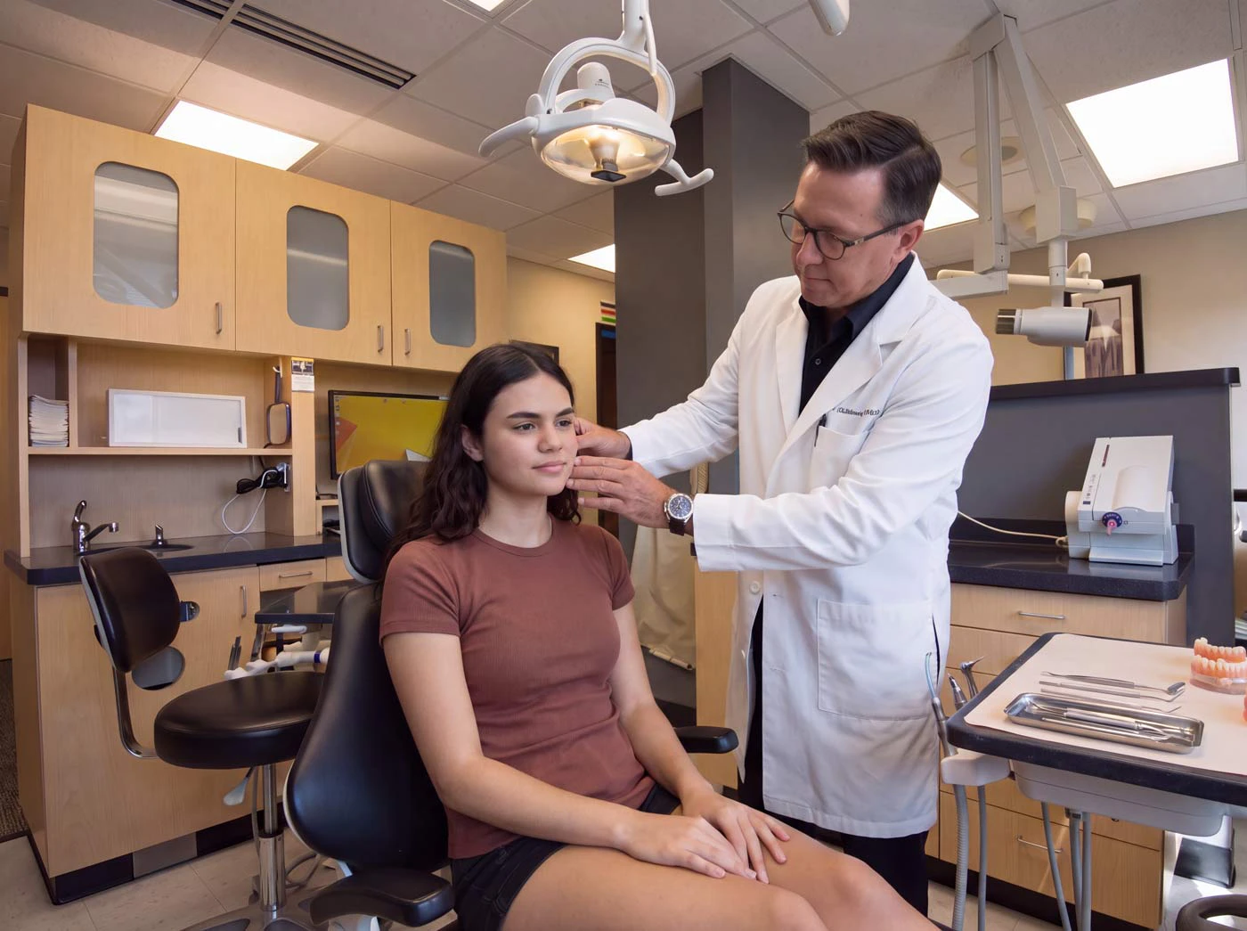 Dr. Goodman examining a patient