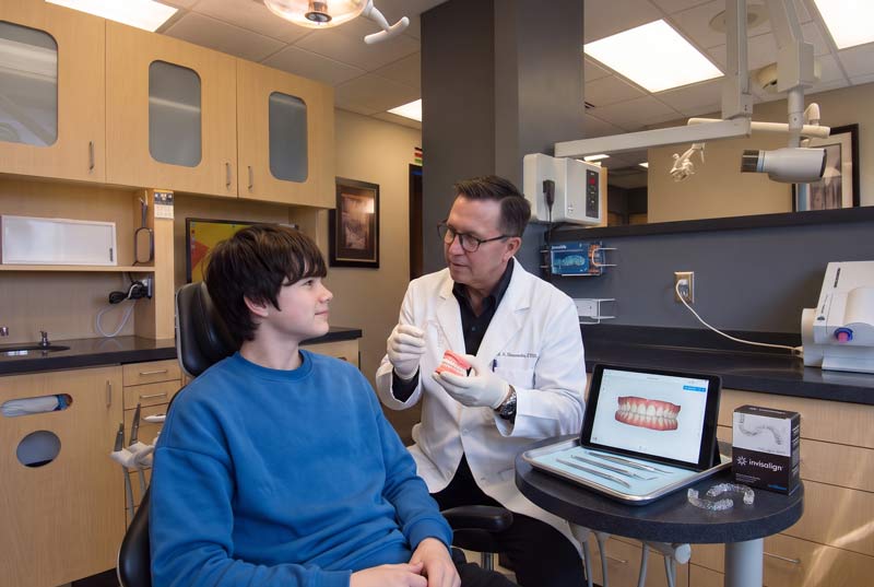 photo of Dr. Goodman with teenage patient