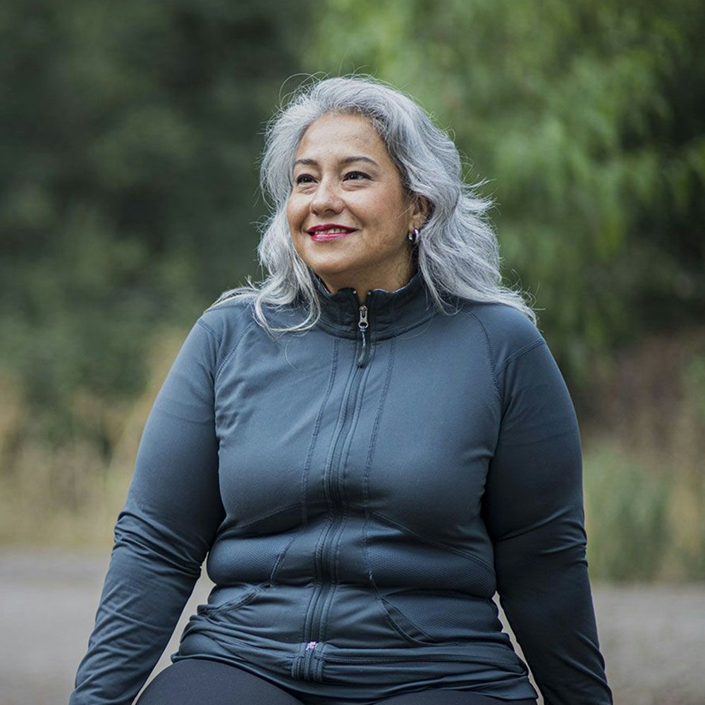 happy woman walking outdoors after gastric bypass