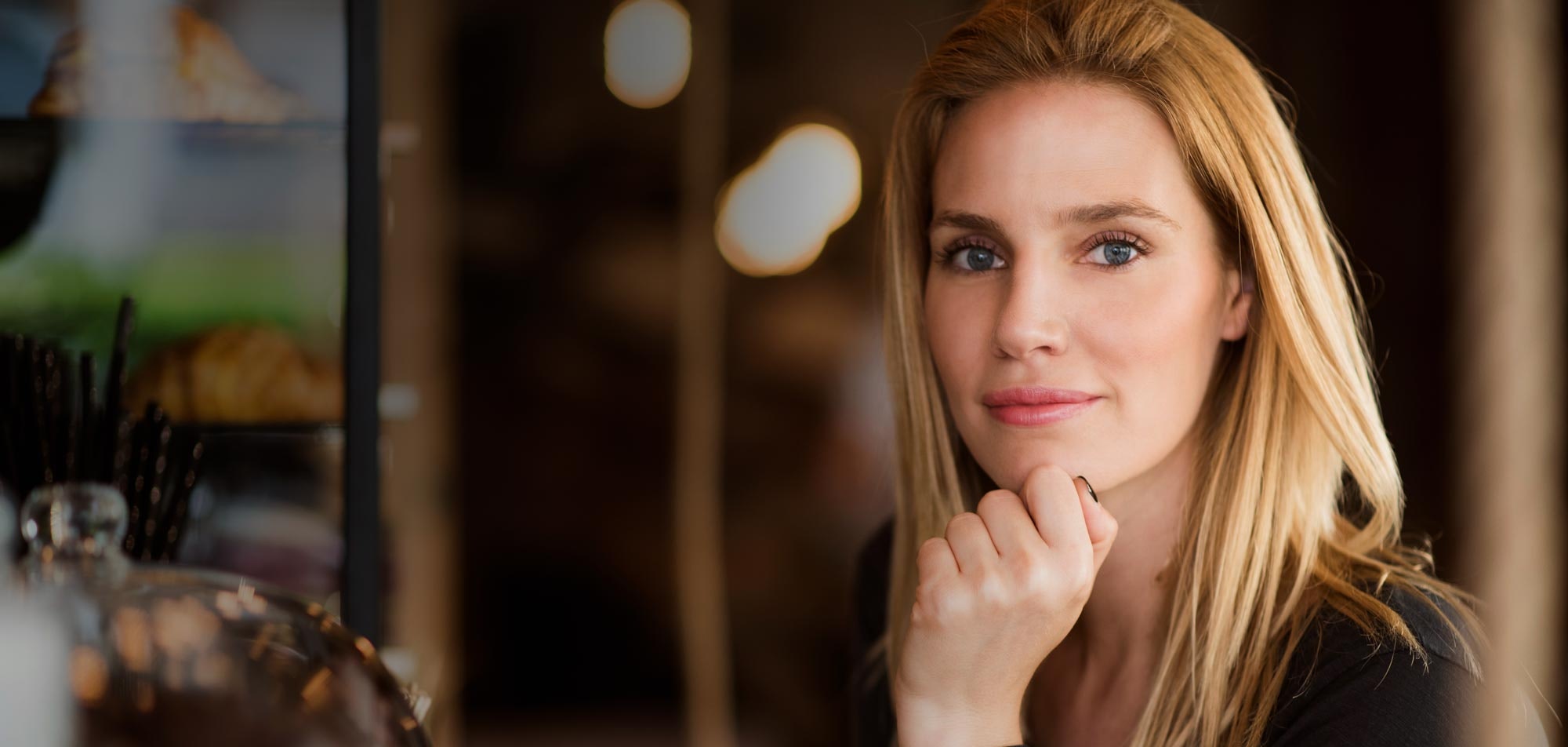 youthful-looking woman smiling at camera
