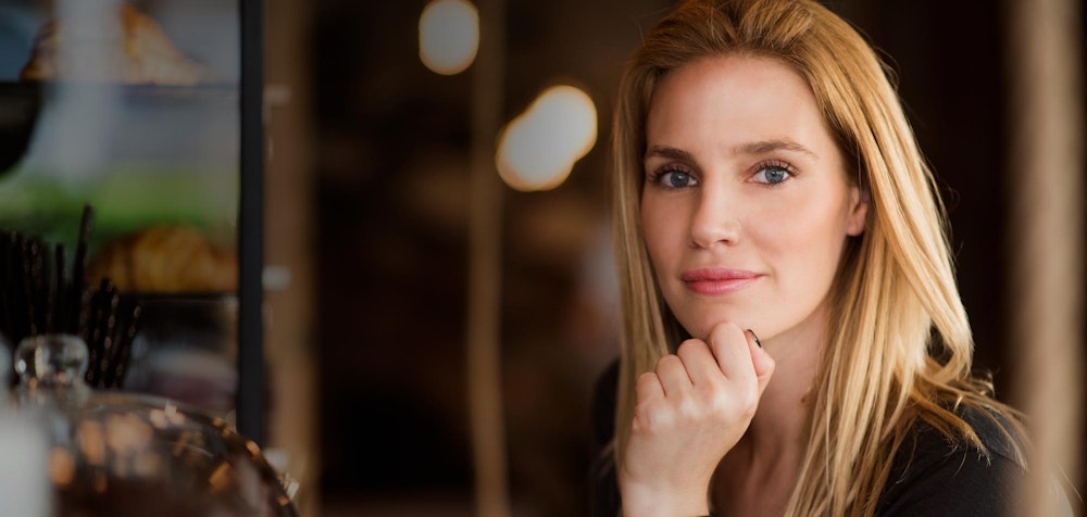 youthful-looking woman smiling at camera