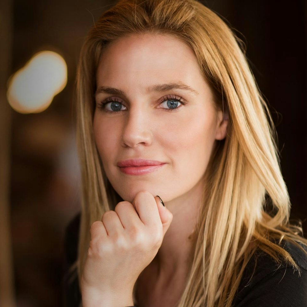 youthful-looking woman smiling at camera