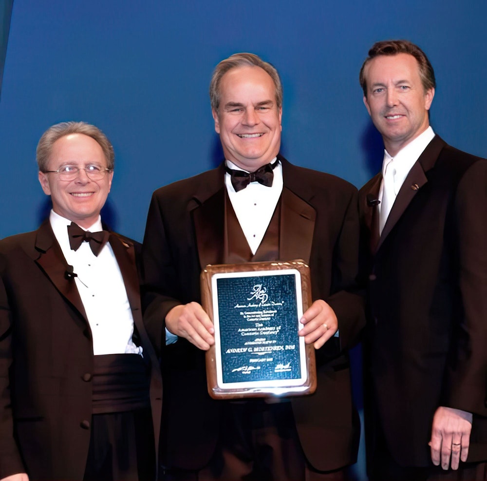 Dr. Mortensen receiving an award