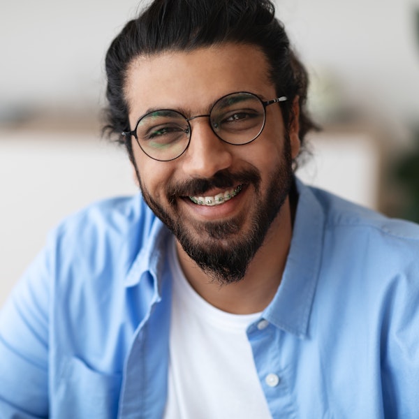 Adult man wearing braces