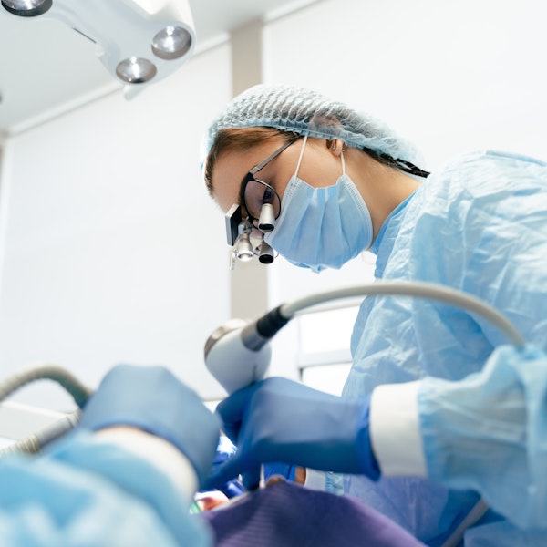 Oral surgeon at work