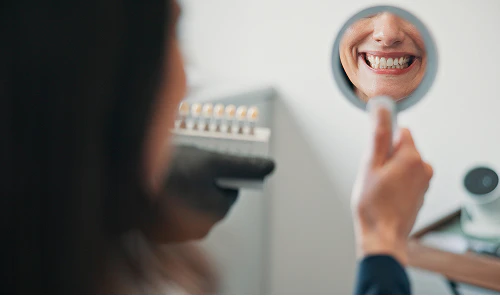 Woman smiling in mirror