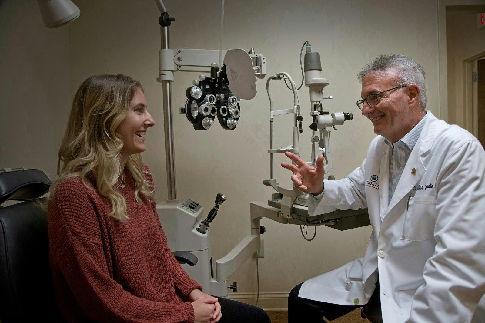 Dr. Choate speaking with a patient