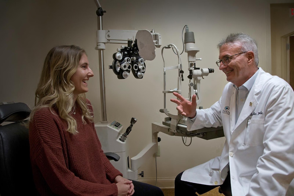 Dr. Choate chatting with a patient