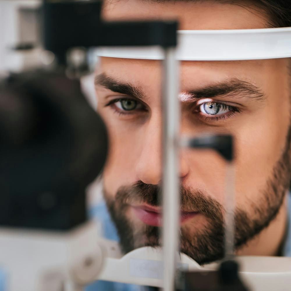 man having his eye examined
