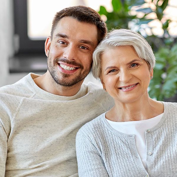 Mother and son smiling