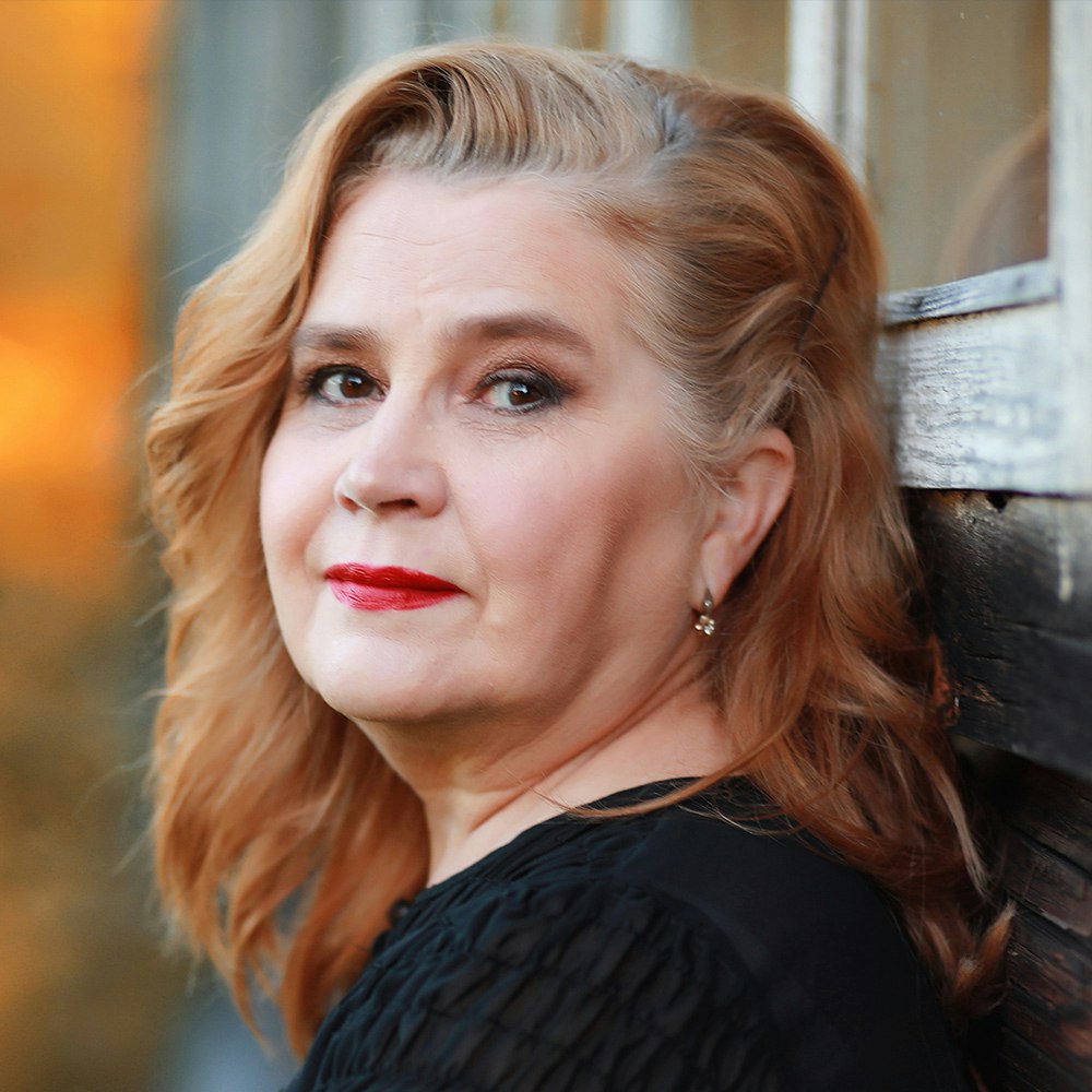 Smiling woman feeling relieved after addressing her diabetic retinopathy