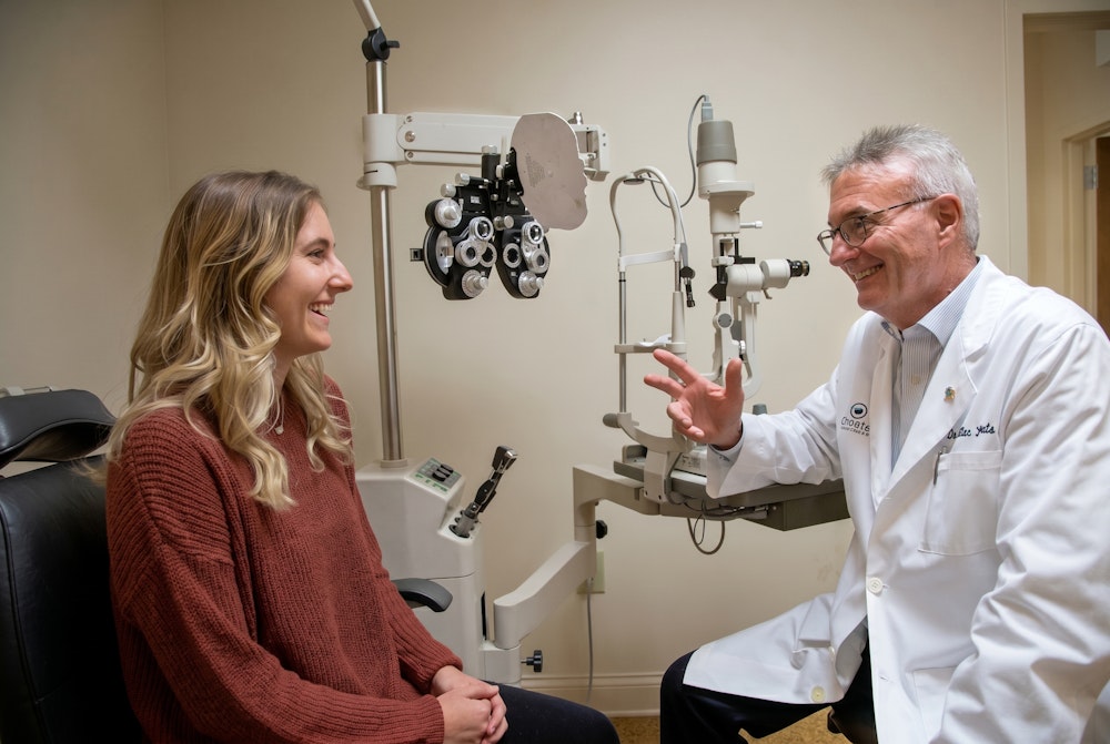Dr. Choate chatting with a patient