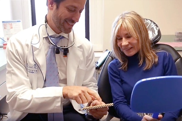 Dr. Trotter Consults with a Patient