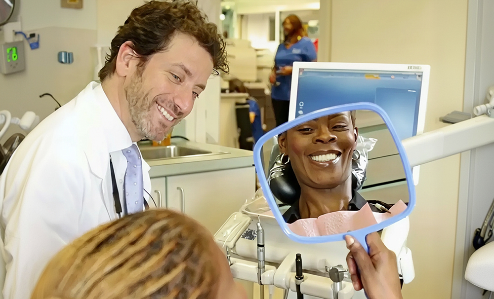 real photo of Dentistry of the Heights dentist and patient