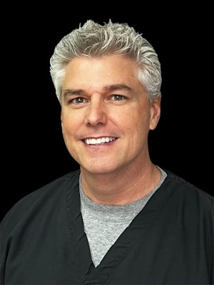 headshot of our dentist, Dr. Jon Marc Van Slate