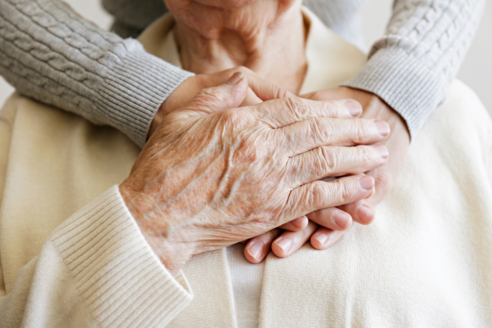elderly person's hand