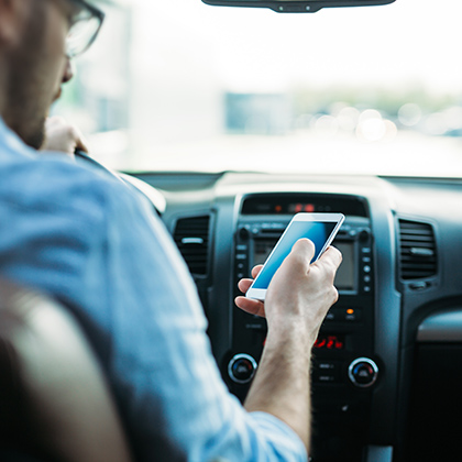 Driver texting behind the wheel