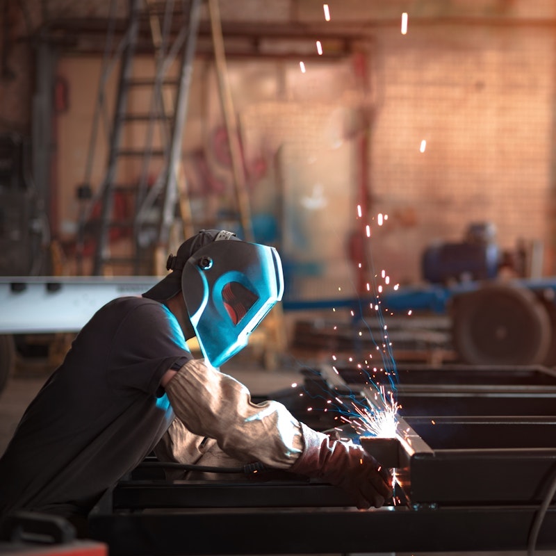 Welder in workshop