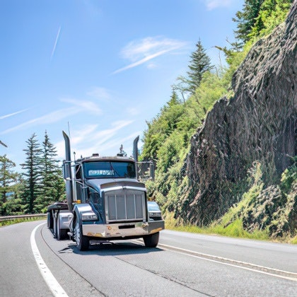 Semi truck driving in the Pacific Northwest