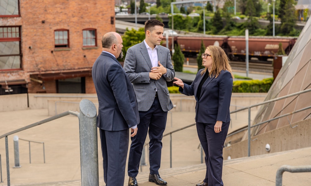 Cochran Douglas attorneys chatting together in Lakewood Washington