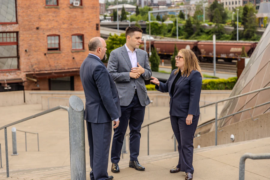 Cochran Douglas attorneys chatting together in Lakewood Washington