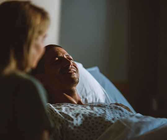 Man in hospital bed