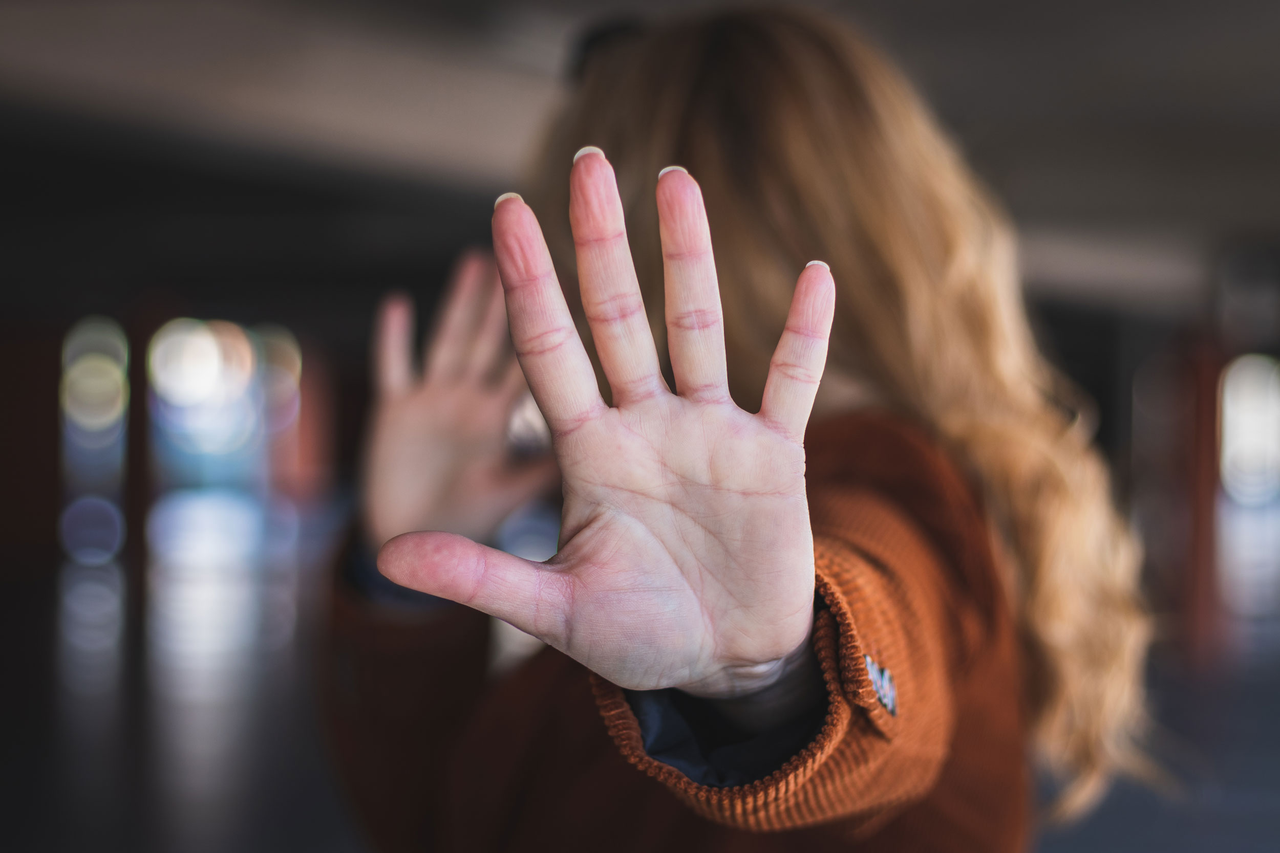 woman holding her palm up to camera in Puyallup, Washington