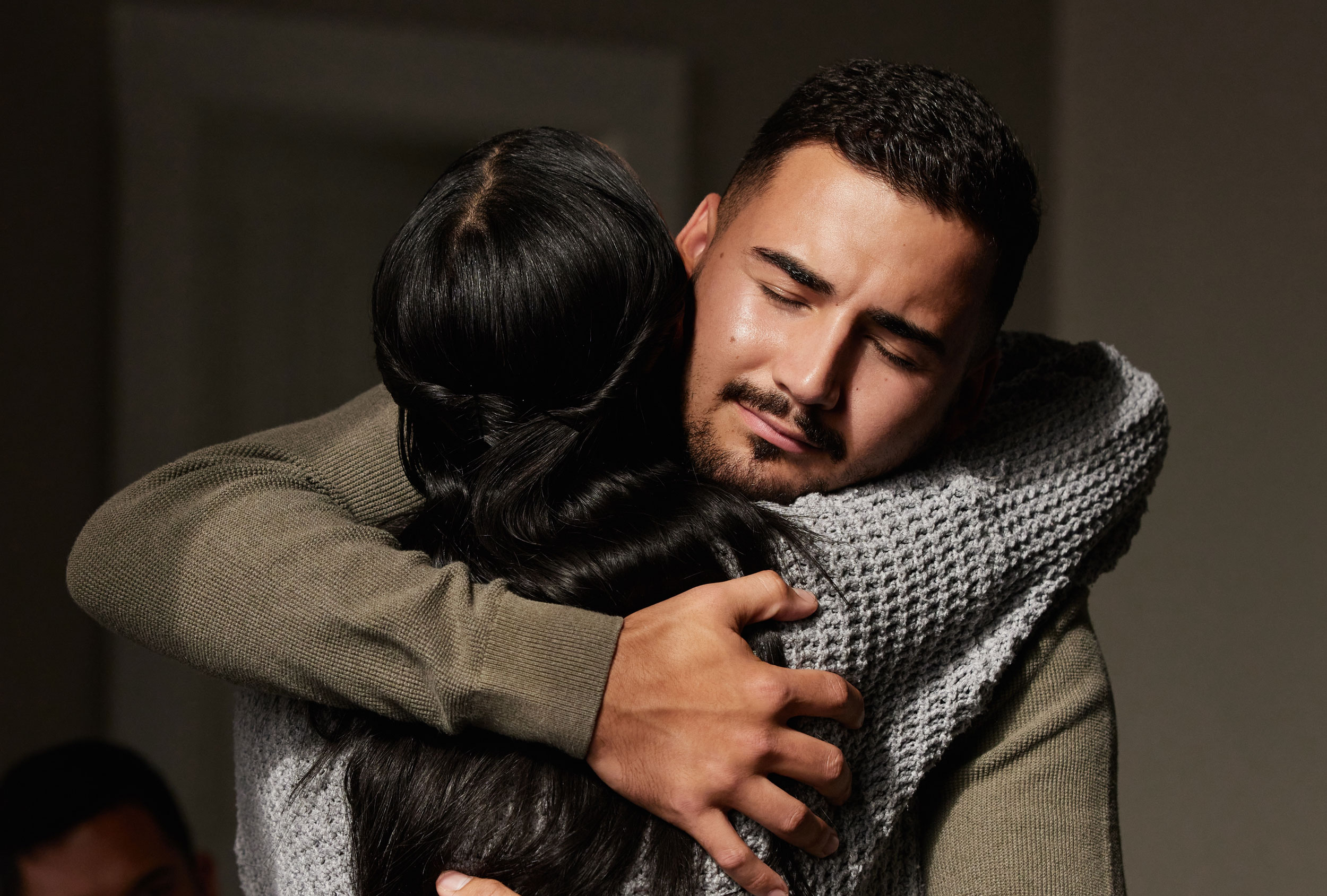 Couple hugging after wrongful death news in Federal Way, Washington