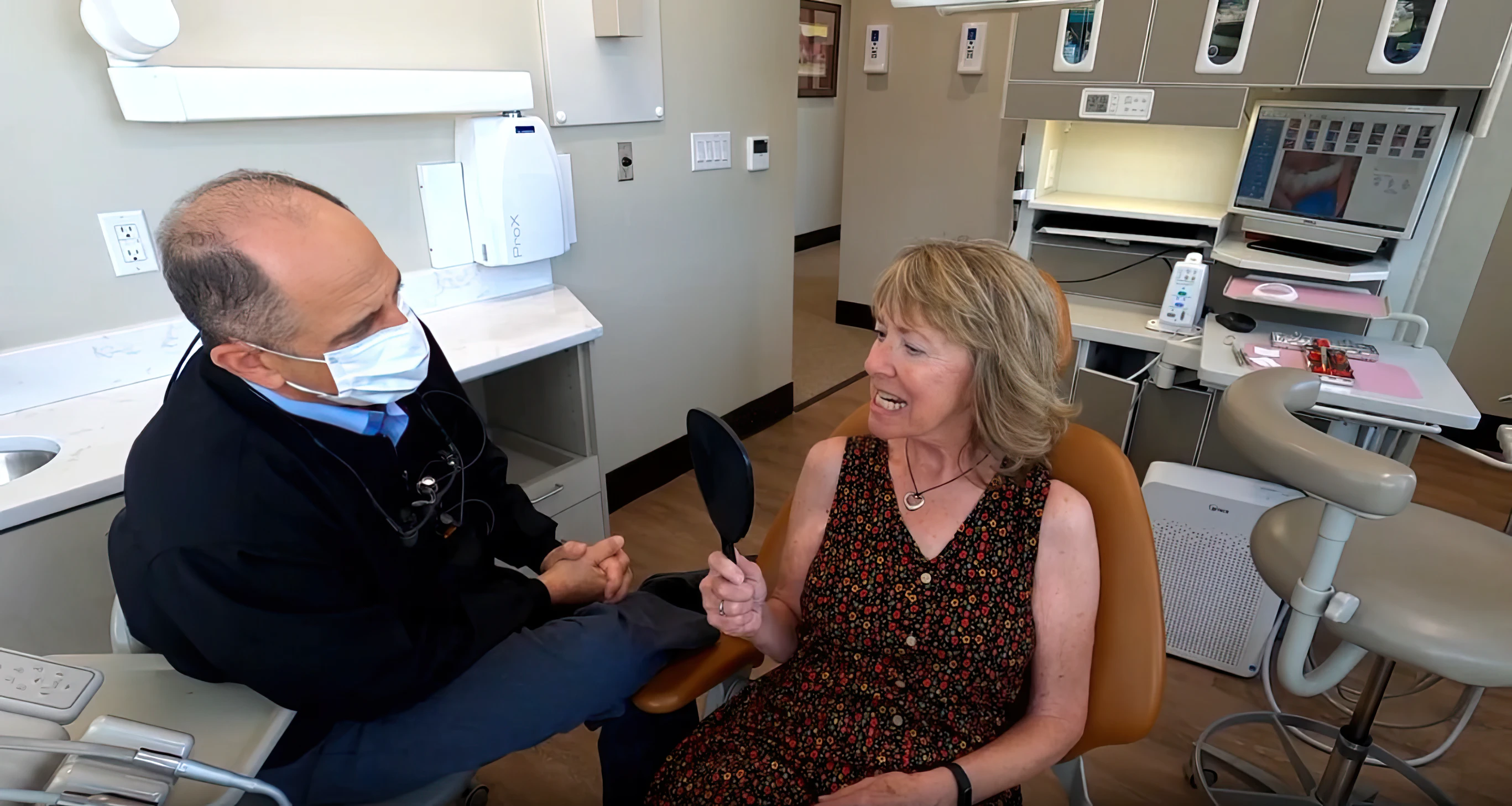 Dr. Slaman with a patient