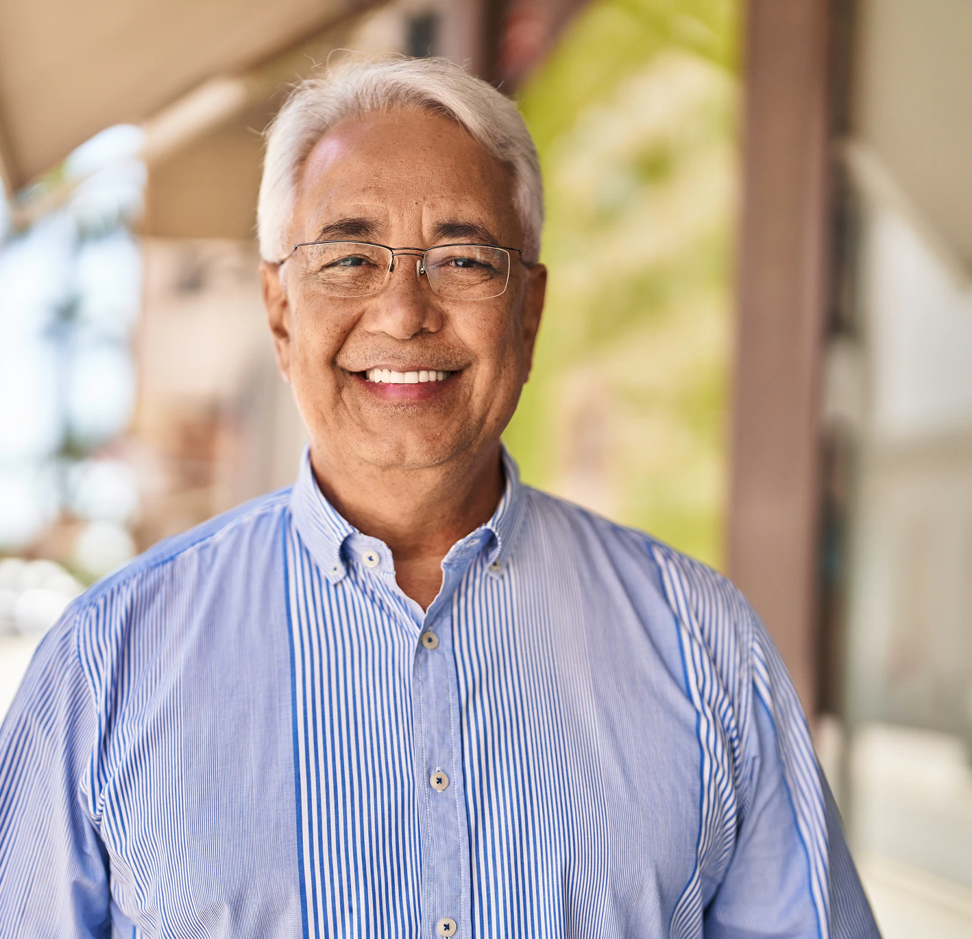 Man in glasses smiling