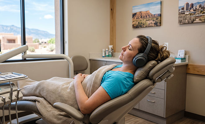 woman sleeping in a dental chair