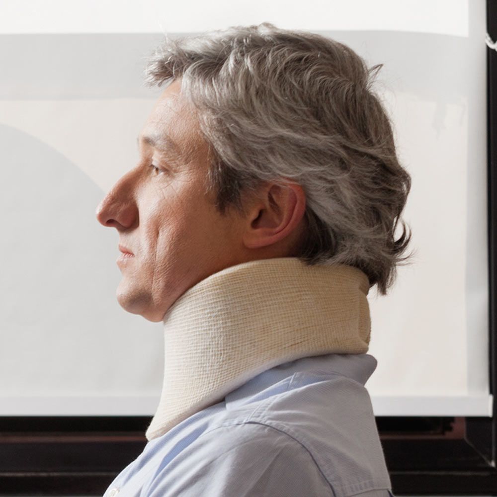 man in neck brace