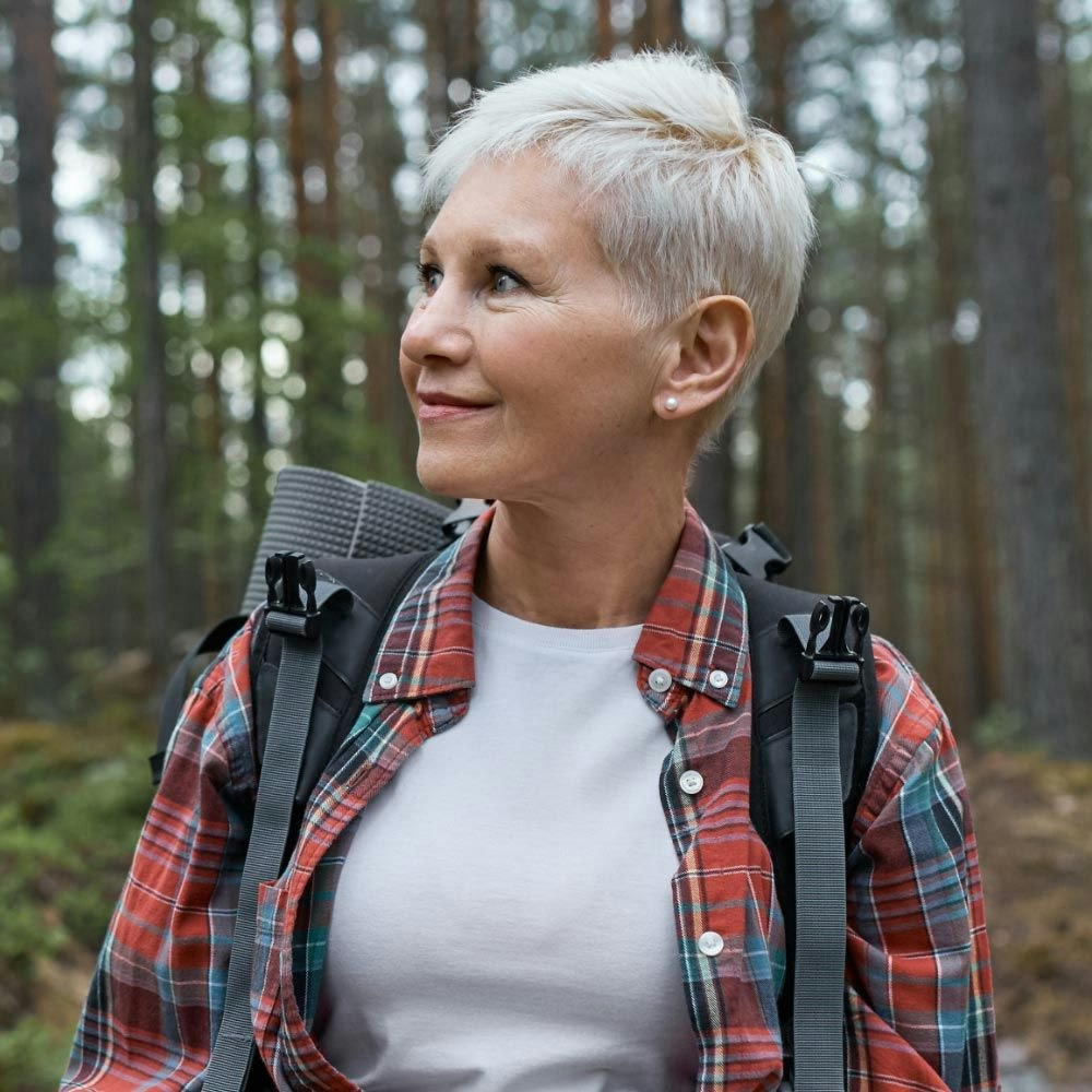 Smiling woman hiking