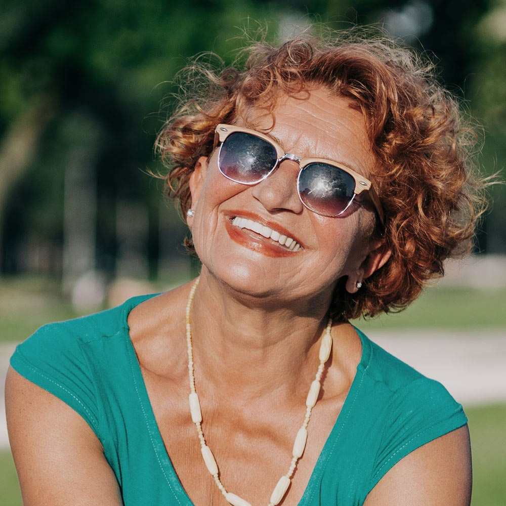 Mature smiling woman outdoors
