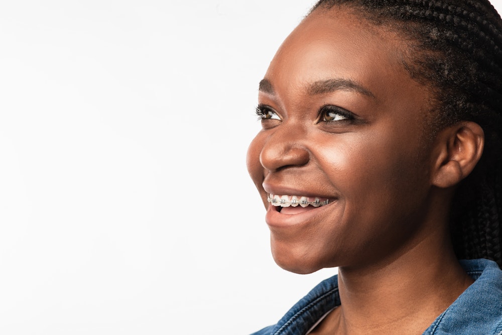 smiling woman with braces