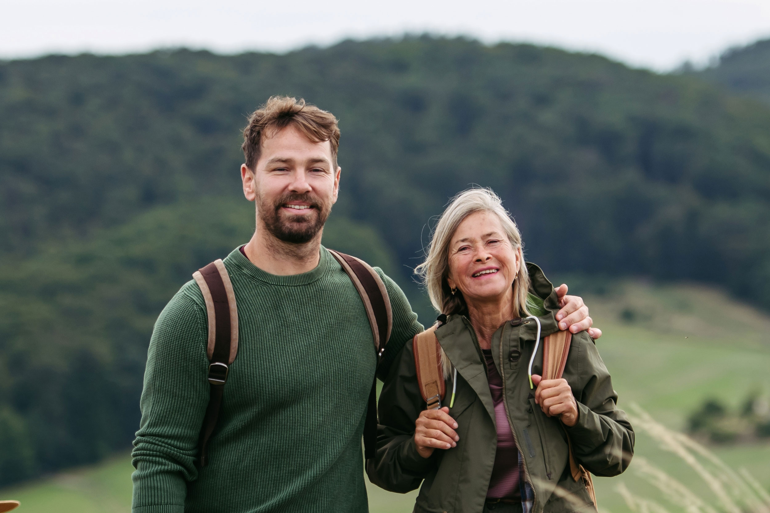son and mother out hiking