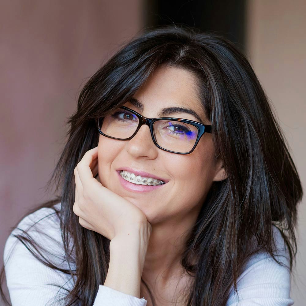 Smiling woman with braces