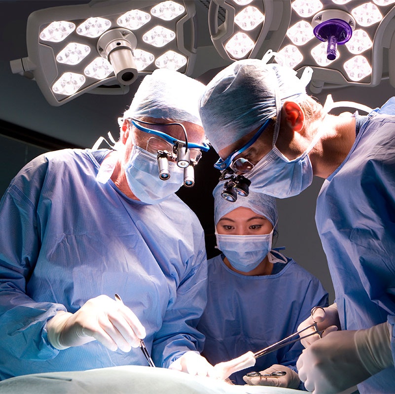 Doctors performing surgery