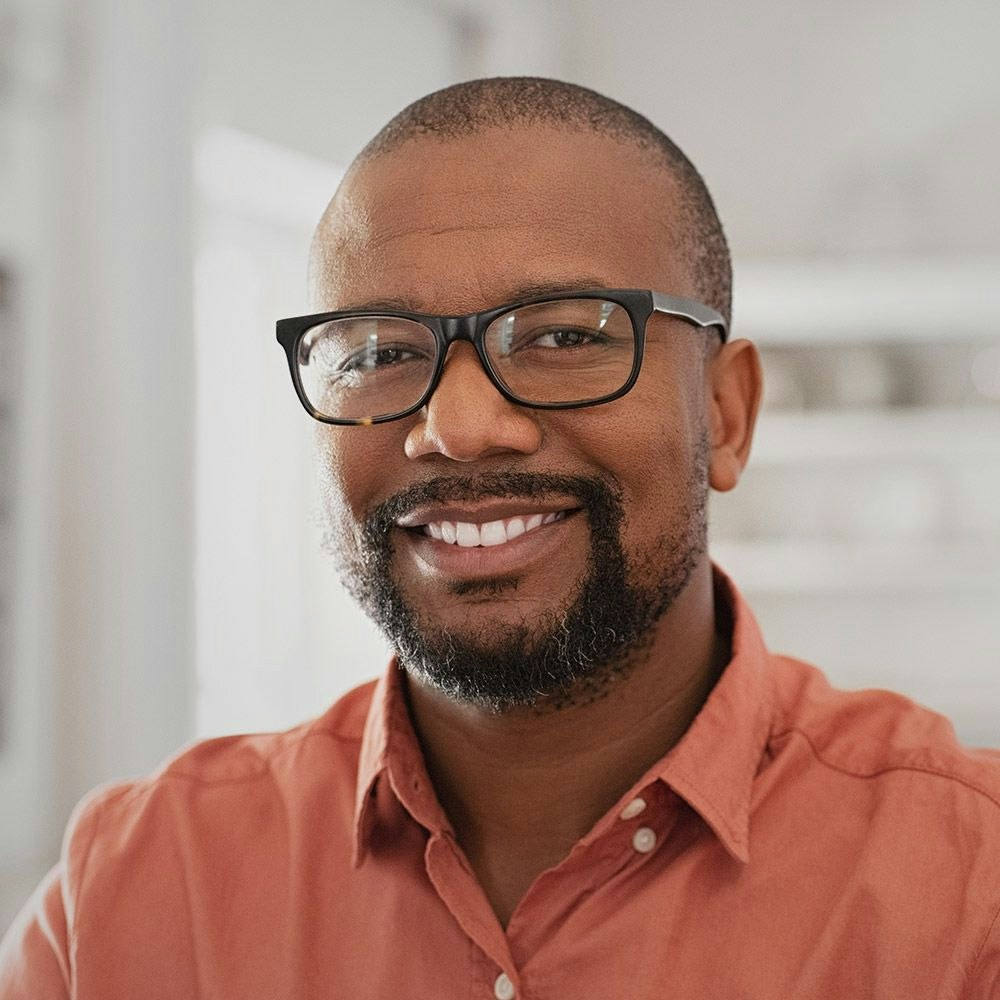 Smiling man wearing glasses