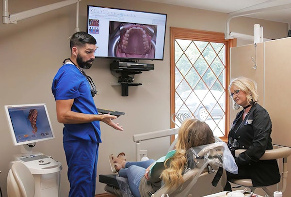 Dentist with patient