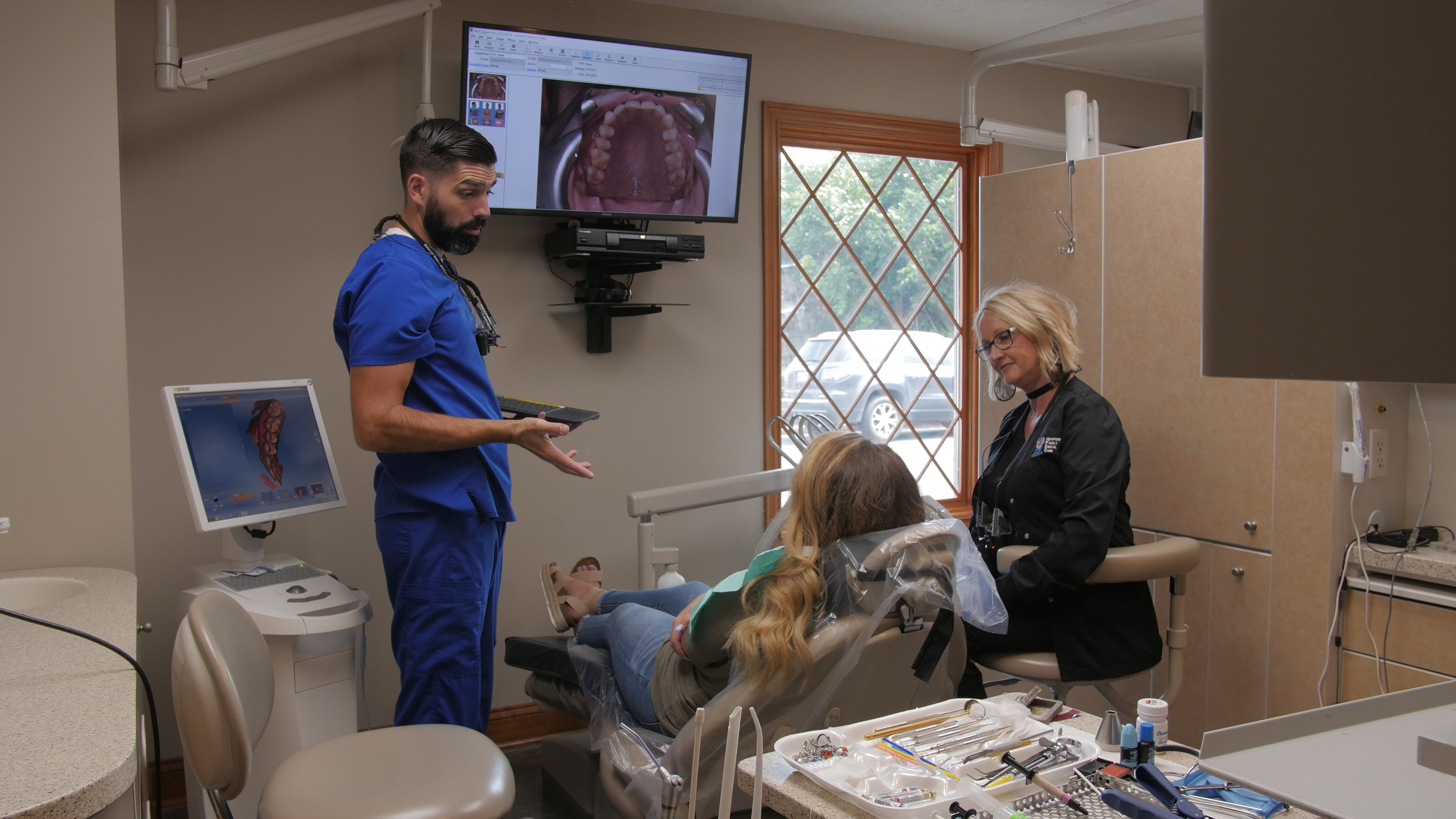 doctor and patient looking at x-ray