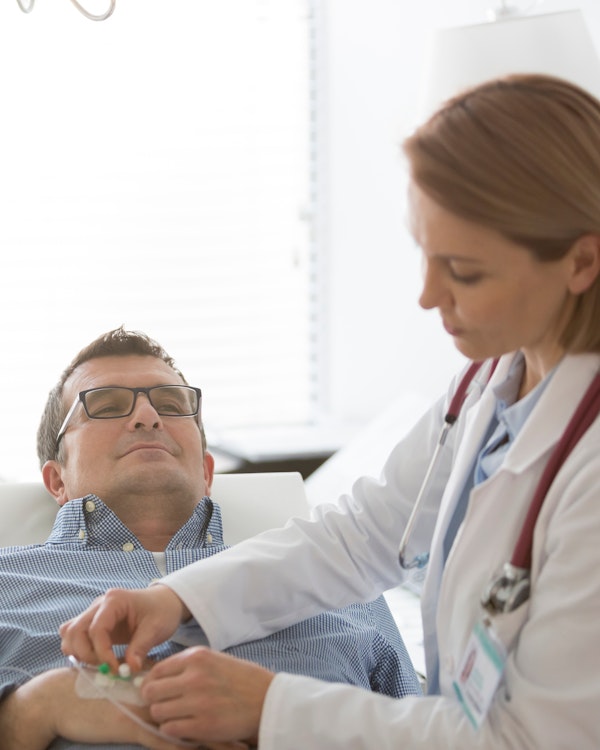 Man receiving IV sedation