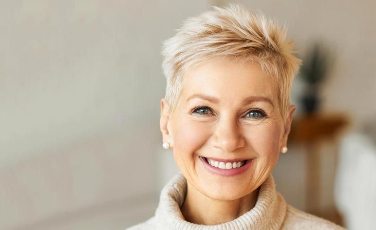 Woman with short blonde hair