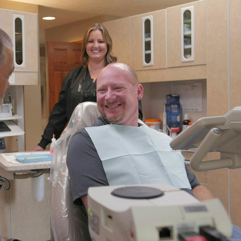 patient smiling in the dental chair