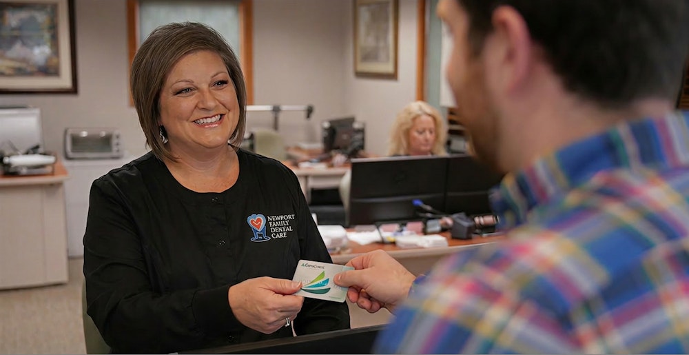staff member accepting CareCredit credit card